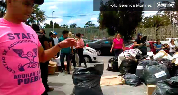 Jóvenes se unen para entregar víveres, no confían en gobiernos