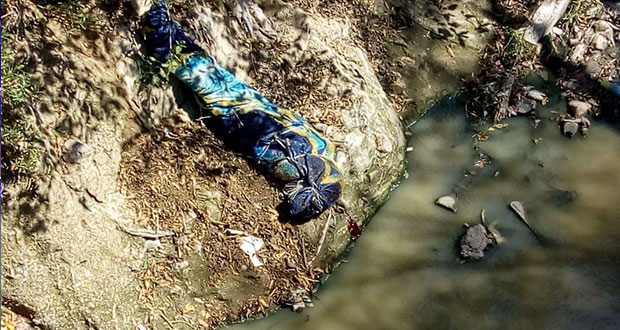 Encuentran cadáver encobijado en barranca de colonia El Paraíso