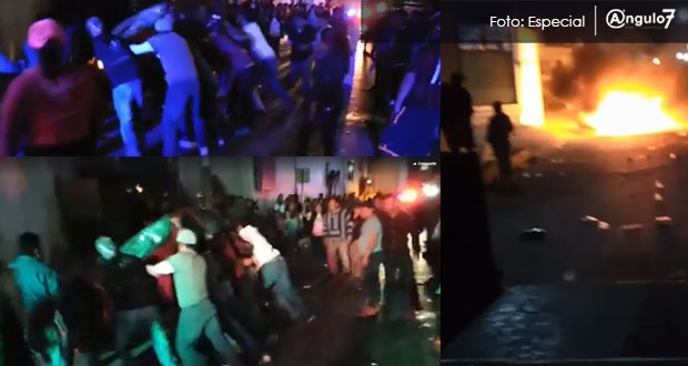 Intentan linchar a conductor y queman su auto en carnaval de Momoxpan. Foto: Especial
