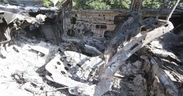 Hallan camioneta con dos cuerpos calcinados en Amozoc