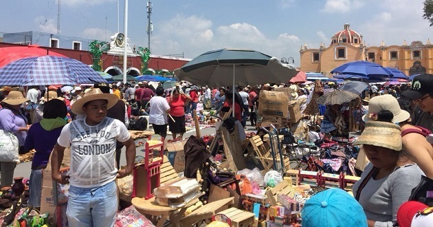 Se olvidan del efectivo en Cholula para conservar la tradición del trueque