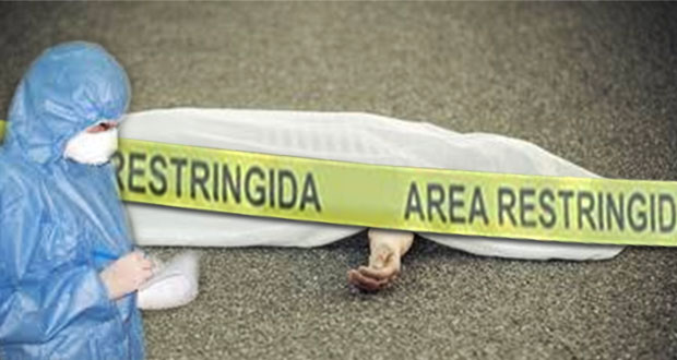 Encuentran cadáver envuelto atrás de escuela en Xochimehuacan