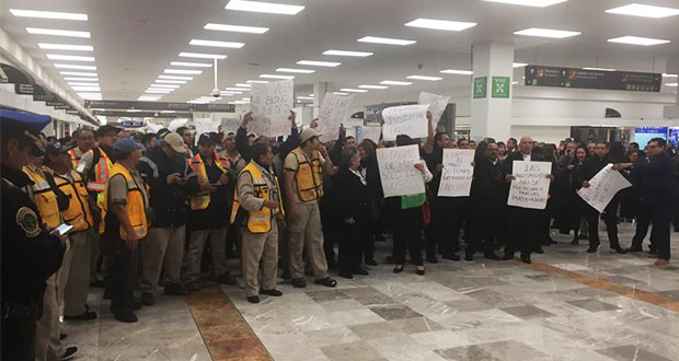 Tras protesta, empleados del NAIM acuerdan bono y pago retroactivo