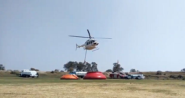 Aeronave cisterna combate incendio forestal en Tepeyahualco: PC