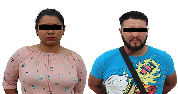 Detienen a pareja por fraude con cheque sin fondos en Puebla capital