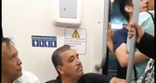 Reaccionan a beso de pareja gay en el Metro y se hacen virales