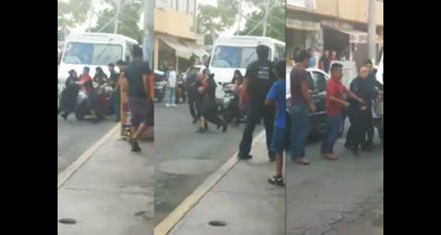 Hombres agreden a mujer policía para evitar arresto de otro