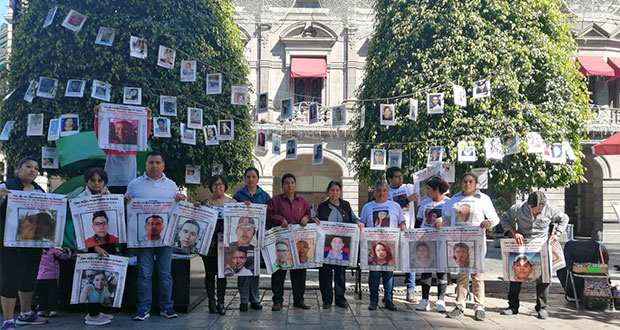 Colocan el “árbol de la esperanza” con 58 fotografías de desaparecidos