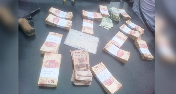Hallan en Tepatlán auto con dinero y armas; acusan compra de votos