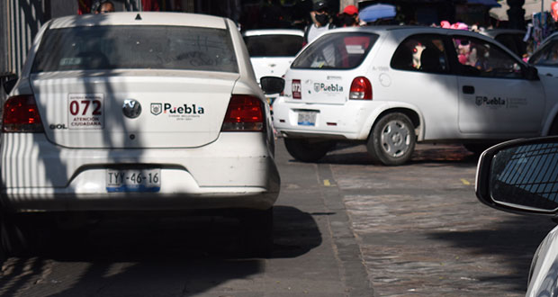 Vehículos de ayuntamiento de Puebla, a resguardo por elecciones