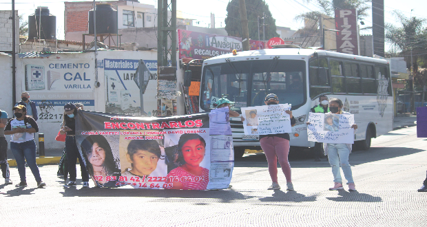 Por desaparición de 3 niños, manifestantes bloquean la 11 Sur