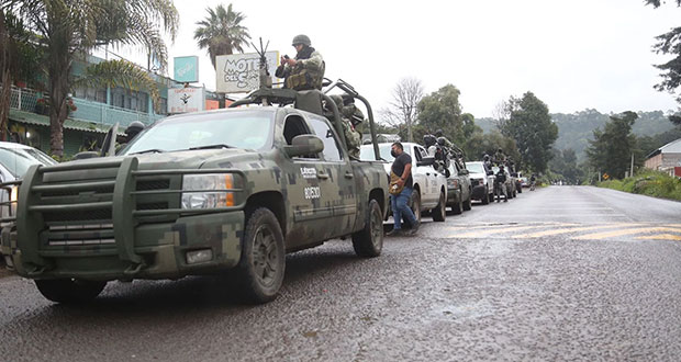 Ejército y GN aseguran a 167 personas  con armas  en Michoacán