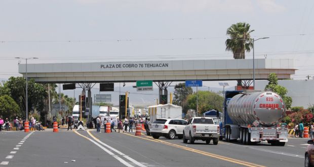 Pobladores de Coyomeapan liberan carreteras; acuerdan diálogo con Segob
