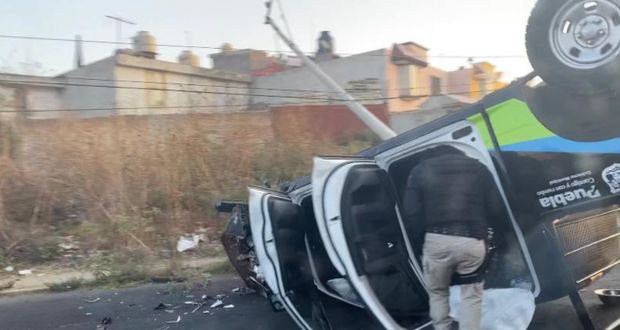 Patrulla de la Policía municipal vuelca en la Vicente Suárez