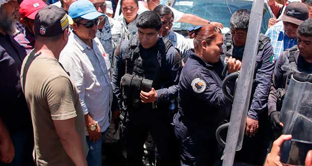 Tras diálogo, liberan a policías detenidos y abren carretera en Guerrero