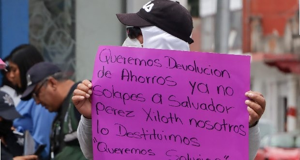 'Naranjitas' en manifestacion para exigir respeto a sus derechos laborales.